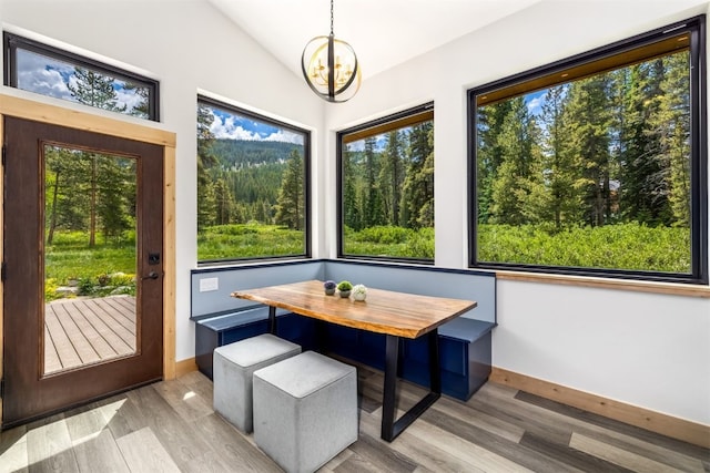 89 Wilderness Dr, Breckenridge, CO 80424 - sunroom featuring healthy amount of natural light, a chandelier, and lofted ceiling