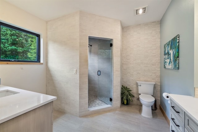 89 Wilderness Dr, Breckenridge, CO 80424 - bathroom featuring vanity, a stall shower, and tile patterned floors