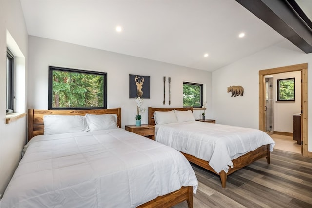 89 Wilderness Dr, Breckenridge, CO 80424 - bedroom featuring wood finished floors, lofted ceiling, and recessed lighting