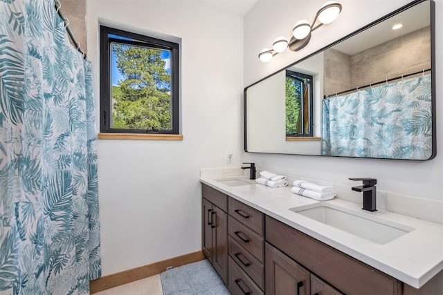 89 Wilderness Dr, Breckenridge, CO 80424 - bathroom with double vanity and a shower with curtain
