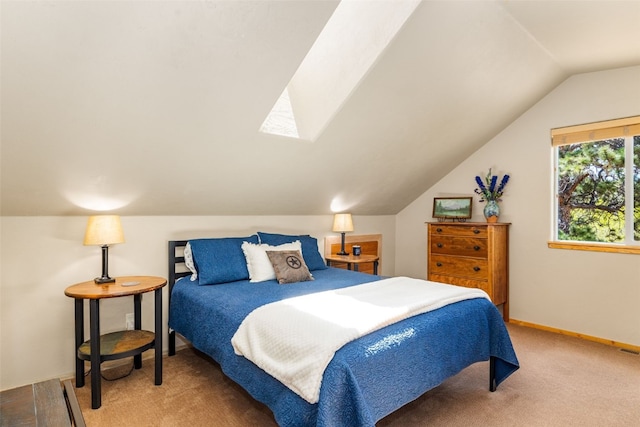 146 Atoka Dr, Como, CO 80432 - carpeted bedroom with vaulted ceiling, baseboards, and a skylight