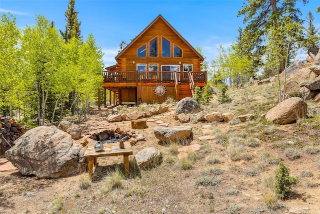 146 Atoka Dr, Como, CO 80432 - back of property with log siding and a deck