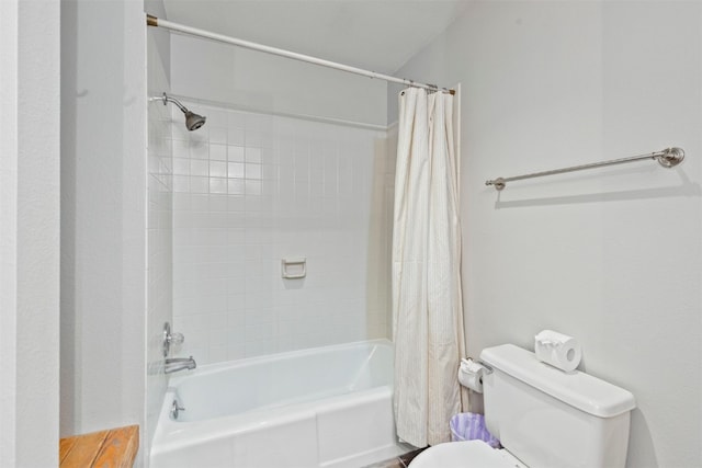 full bathroom featuring toilet and shower / tub combo