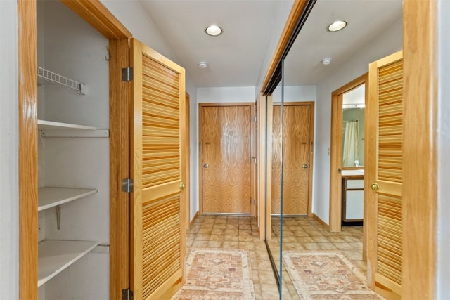 hallway featuring recessed lighting