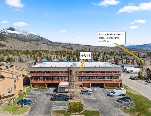 drone / aerial view of a mountainous background