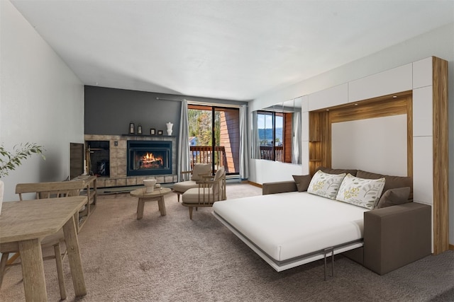 living room featuring light colored carpet and a fireplace