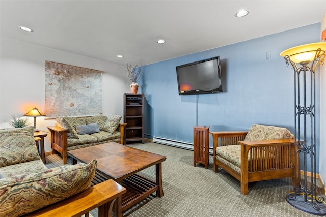 carpeted living area with recessed lighting, baseboards, and a baseboard heating unit