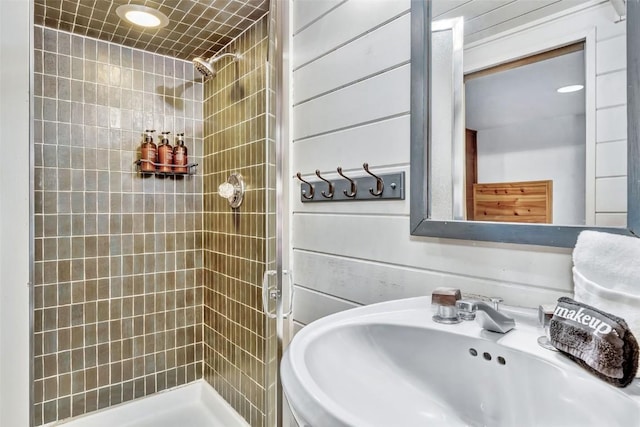 2615 Apres Ski Way Unit B1, Steamboat Springs, CO 80487 - bathroom with a sink and tiled shower