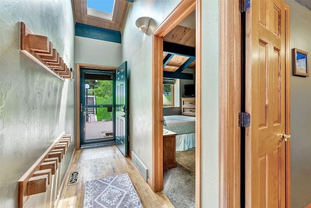 2615 Apres Ski Way Unit B1, Steamboat Springs, CO 80487 - entryway with wood finished floors and beam ceiling
