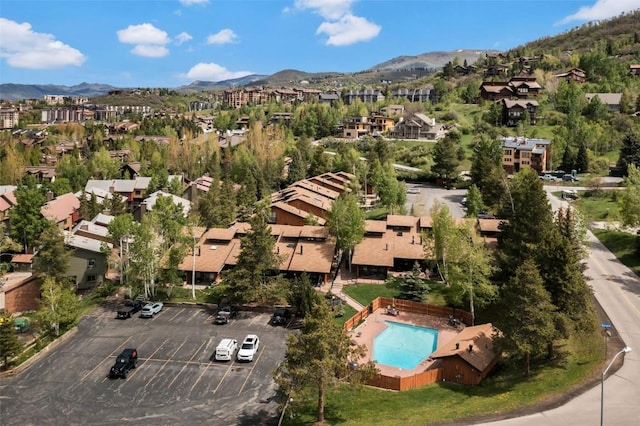 2615 Apres Ski Way Unit B1, Steamboat Springs, CO 80487 - aerial perspective of suburban area featuring a mountainous background and a pool area