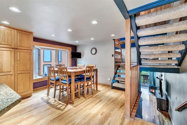 2615 Apres Ski Way Unit B1, Steamboat Springs, CO 80487 - dining space featuring stairway, recessed lighting, light wood-style floors, and baseboards