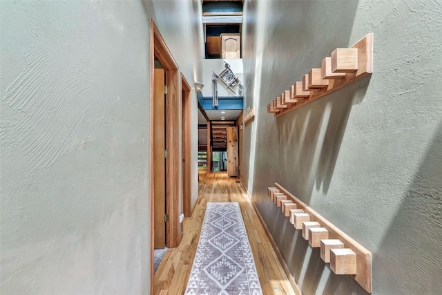 2615 Apres Ski Way Unit B1, Steamboat Springs, CO 80487 - hall featuring wood finished floors and stairs