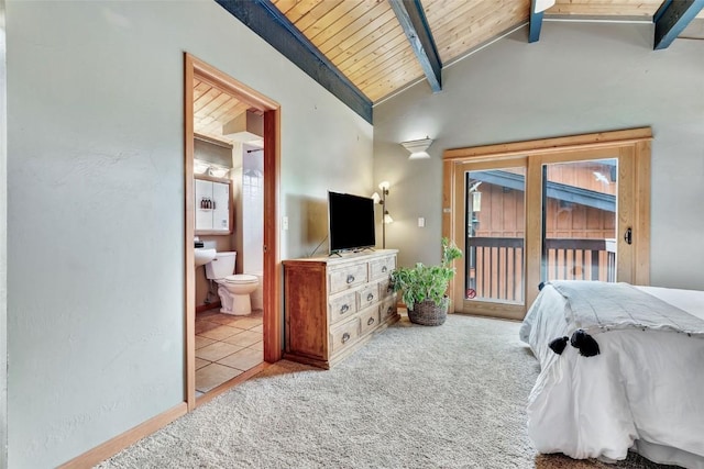 2615 Apres Ski Way Unit B1, Steamboat Springs, CO 80487 - bedroom with access to outside, ensuite bathroom, wood ceiling, and carpet flooring