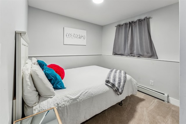 bedroom featuring light carpet and baseboard heating