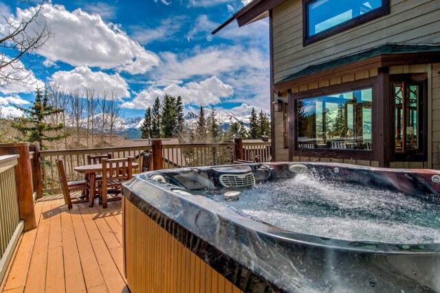 185 S Fuller Placer Rd, Breckenridge, CO 80424 - deck with a hot tub and a mountain view