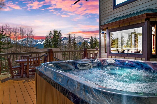 185 S Fuller Placer Rd, Breckenridge, CO 80424 - wooden deck with a hot tub and a mountain view