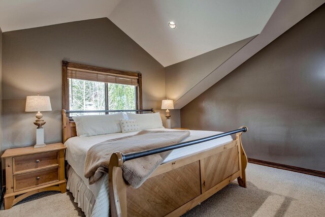 185 S Fuller Placer Rd, Breckenridge, CO 80424 - bedroom featuring lofted ceiling, light carpet, and baseboards