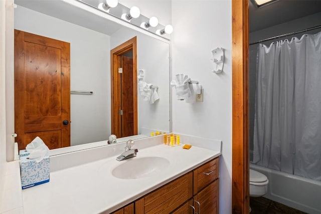 full bath featuring shower / tub combo, toilet, vanity, and tile patterned floors