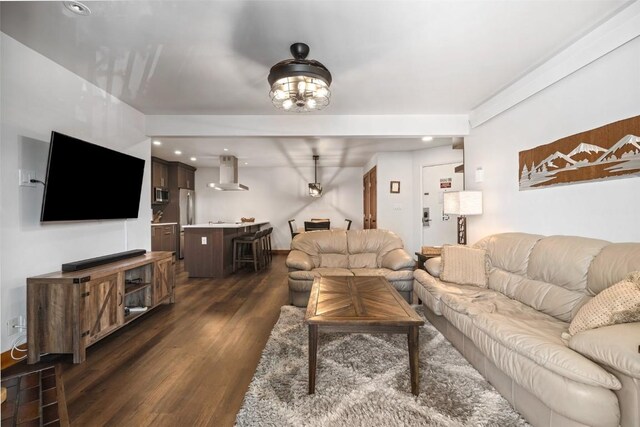 living room featuring dark wood-style floors and recessed lighting