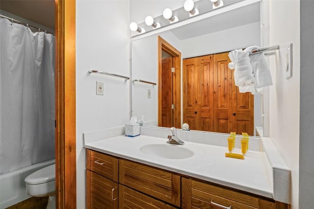 bathroom featuring toilet, vanity, and shower / bathtub combination with curtain