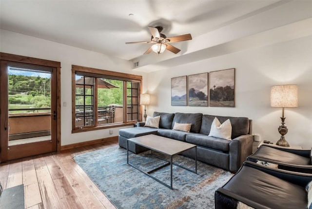 1110 Yampa St Unit R8, Steamboat Springs, CO 80487 - living area featuring wood finished floors, ceiling fan, and baseboards