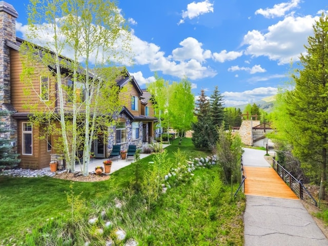 180 Robin Dr Unit 180, Silverthorne, CO 80498 - view of grassy yard featuring a patio