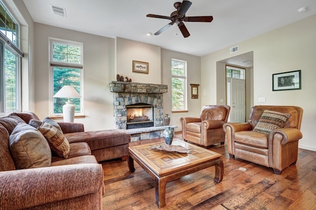 180 Robin Dr Unit 180, Silverthorne, CO 80498 - living room with wood-type flooring, plenty of natural light, a fireplace, a ceiling fan, and recessed lighting