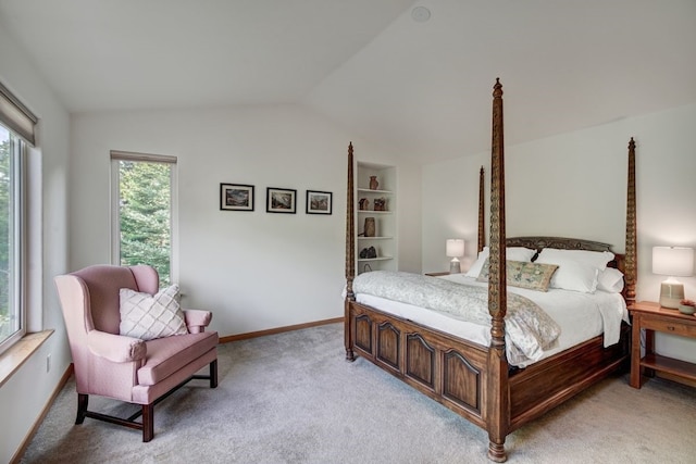 180 Robin Dr Unit 180, Silverthorne, CO 80498 - bedroom featuring lofted ceiling, light colored carpet, and baseboards