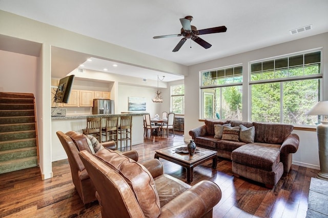 180 Robin Dr Unit 180, Silverthorne, CO 80498 - living area featuring hardwood / wood-style flooring, stairway, ceiling fan, and baseboards