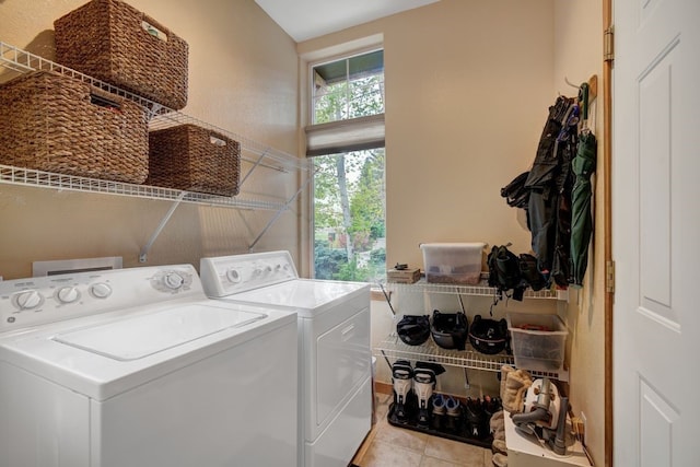 180 Robin Dr Unit 180, Silverthorne, CO 80498 - laundry area featuring washing machine and clothes dryer and light tile patterned flooring