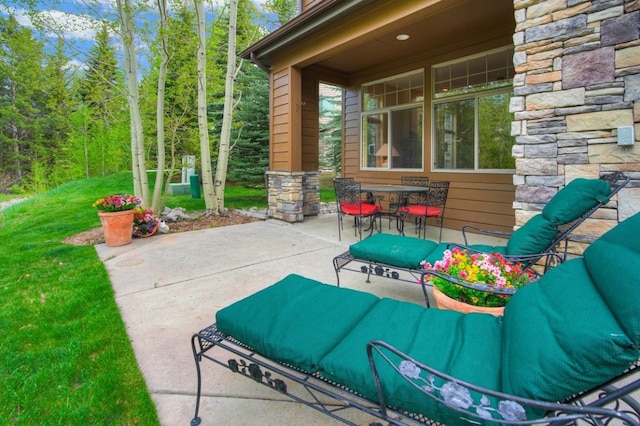 180 Robin Dr Unit 180, Silverthorne, CO 80498 - view of patio featuring outdoor dining space