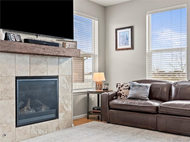 1527 Biffle Ct, Berthoud, CO 80513 - living area with a fireplace and baseboards