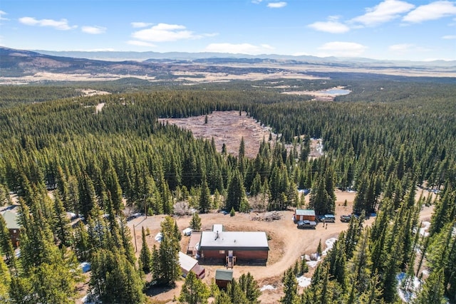 491 Valley Of The Sun Dr, Fairplay, CO 80440 - aerial view of property's location featuring a heavily wooded area and a mountain backdrop