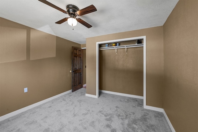 491 Valley Of The Sun Dr, Fairplay, CO 80440 - unfurnished bedroom with carpet, baseboards, a closet, and ceiling fan