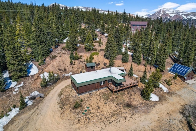 491 Valley Of The Sun Dr, Fairplay, CO 80440 - aerial view of property and surrounding area with a heavily wooded area and a mountainous background