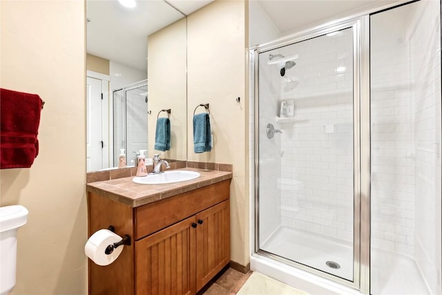300 Base Camp Cir Unit 405, Granby, CO 80446 - bathroom with a shower stall, vanity, and tile patterned flooring