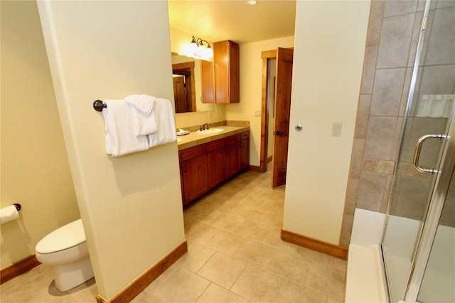30 Union Creek Trl Bldg 2 # 201, Copper Mountain, CO 80443 - bathroom featuring toilet, baseboards, an enclosed shower, and vanity