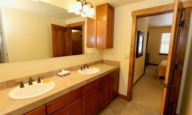 30 Union Creek Trl Bldg 2 # 201, Copper Mountain, CO 80443 - ensuite bathroom featuring tile patterned flooring, a sink, double vanity, and connected bathroom