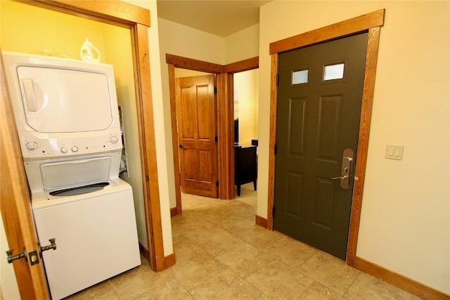30 Union Creek Trl Bldg 2 # 201, Copper Mountain, CO 80443 - laundry room featuring baseboards, stacked washer and clothes dryer, and laundry area
