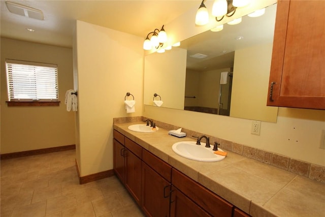 30 Union Creek Trl Bldg 2 # 201, Copper Mountain, CO 80443 - full bathroom with tile patterned flooring, a sink, visible vents, and double vanity