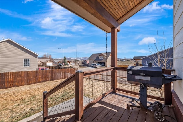 342 Lake View Rd, Hayden, CO 81639 - wooden terrace featuring fence and a residential view