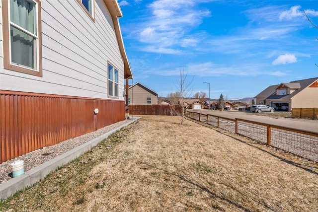 342 Lake View Rd, Hayden, CO 81639 - view of yard with a residential view and fence