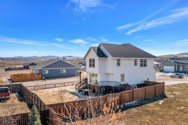 342 Lake View Rd, Hayden, CO 81639 - back of house with a fenced backyard and a mountain view