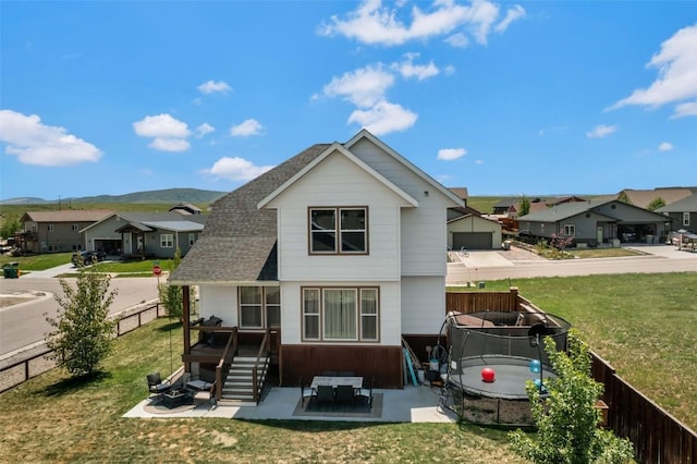 342 Lake View Rd, Hayden, CO 81639 - rear view of house featuring a residential view, a patio area, and a shingled roof