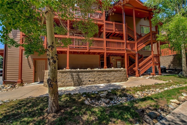 163 Pelican Cir Unit 1202, Breckenridge, CO 80424 - view of front facade with stairs and a deck
