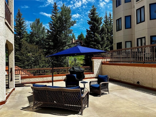 2800 Eagleridge Dr Unit C1, Steamboat Springs, CO 80487 - view of patio / terrace featuring an outdoor hangout area and grilling area