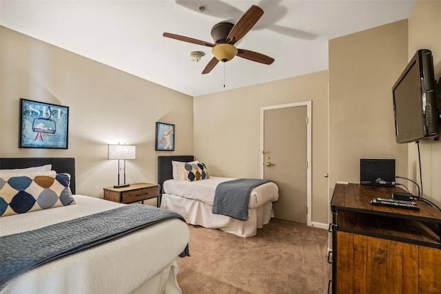 2800 Eagleridge Dr Unit C1, Steamboat Springs, CO 80487 - bedroom featuring light carpet, an office area, and ceiling fan