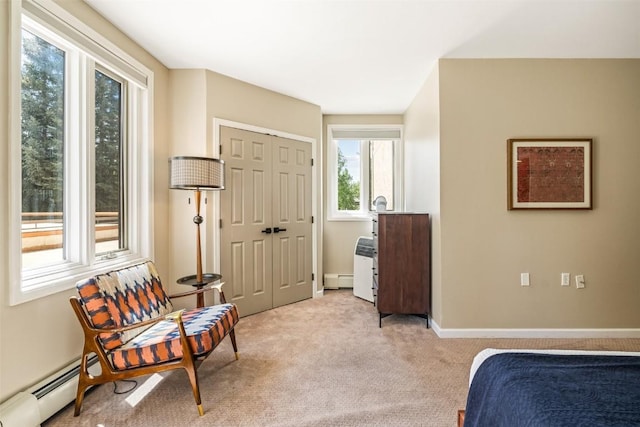 2800 Eagleridge Dr Unit C1, Steamboat Springs, CO 80487 - bedroom with light colored carpet, a closet, and a baseboard heating unit