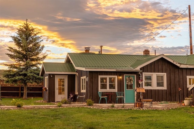 33685 State Highway 134, Toponas, CO 80479 - back of house featuring a chimney, board and batten siding, and a metal roof