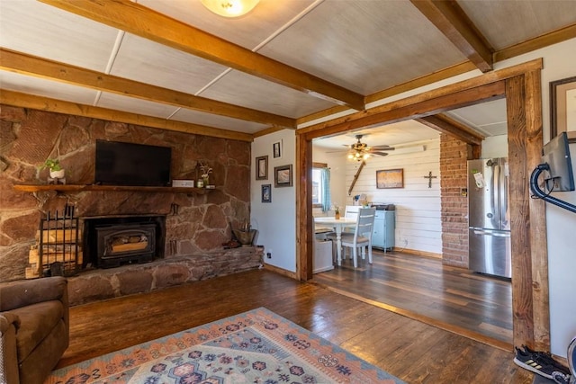 33685 State Highway 134, Toponas, CO 80479 - living room with wood-type flooring, beamed ceiling, and ceiling fan